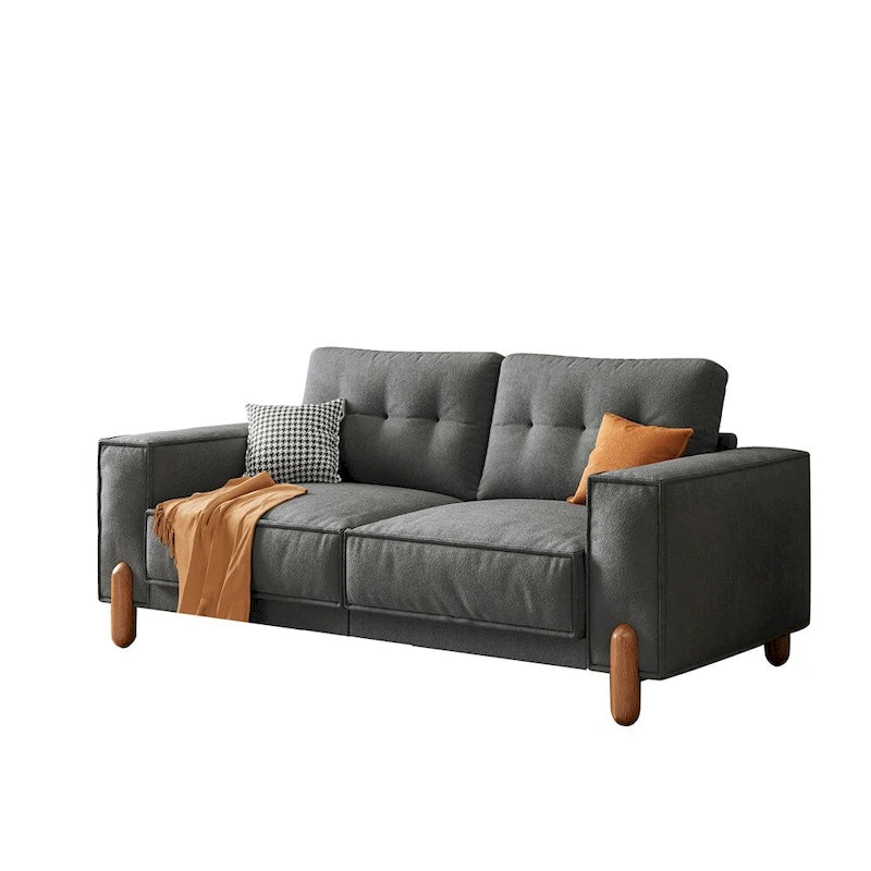 Moderne bank met teddy-stoffen bekleding, houten poten en 2 kussens