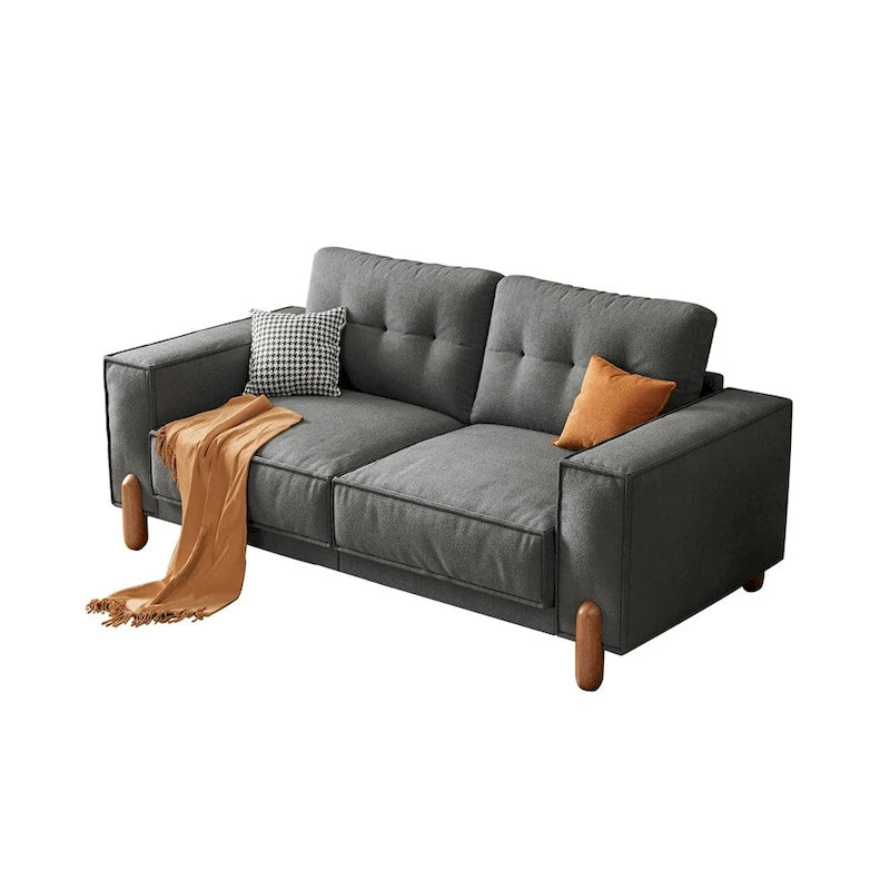 Moderne bank met teddy-stoffen bekleding, houten poten en 2 kussens